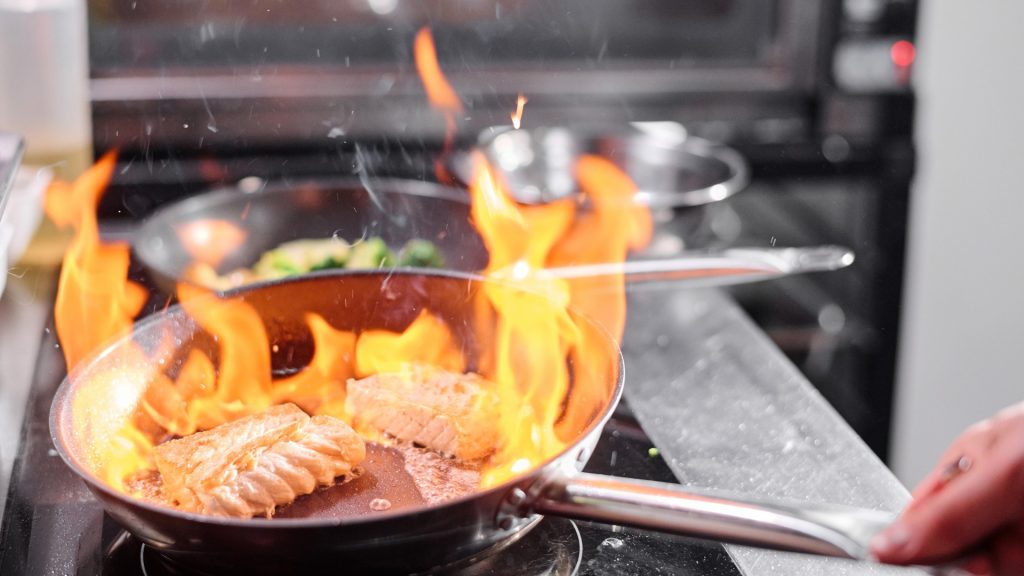 Food in pan with fire
